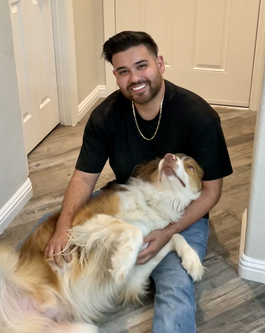 Aaron Gonzalez, owner of In Line K9, with his Australian Shepherd Maverick